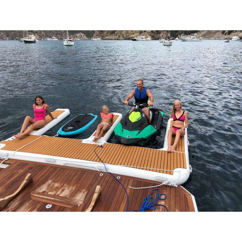 Yachtbeach Jet Ski Dock Double 4.10 - 3 People Sitting on Dock & 1 Man on Jet Ski in Water in Dock