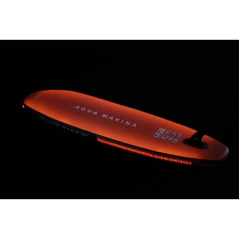 Aqua Marina Glow Inflatable SUP Lit Up in Orange Back View