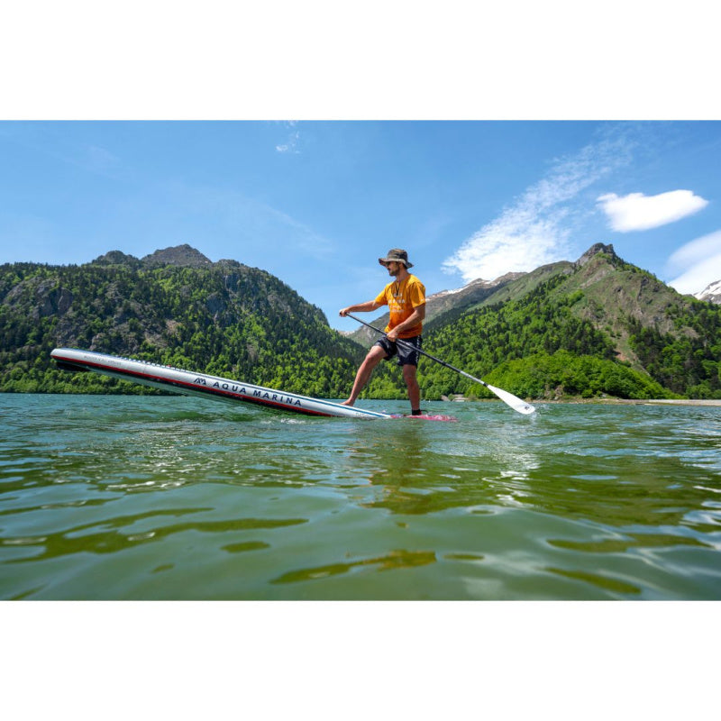 Man Paddling Aqua Marina Hyper Inflatable SUP with Front End Up Above the Water