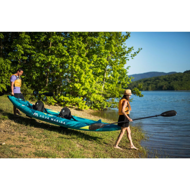 2 People Carrying Aqua Marina Steam 412 Inflatable Kayak into Lake