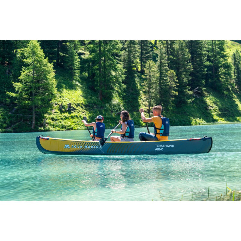 3 People Paddling Aqua Marina Tomahawk Air-C Inflatable Canoe in Lake Side View