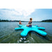 1 Girl Sitting on Yoga Dock & 1 Girl Sitting on SUP Connected to Yoga Dock in Water