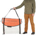 Man Holding Strap of Oru Kayak Bay ST Carrying Bag 