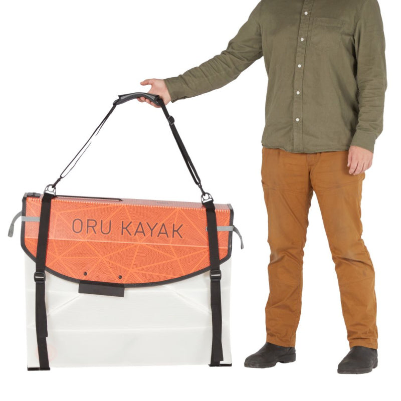 Man Holding Strap of Oru Kayak Bay ST Carrying Bag 