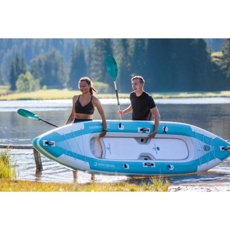 Spinera Adriatic 140 Inflatable Kayak - Man and Woman Carrying Kayak Out of Water