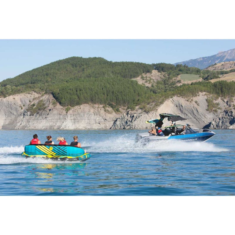 Spinera Professional Just Fun 4 Towable 4 Person Tube - 4 People Riding Back View with Boat on Right
