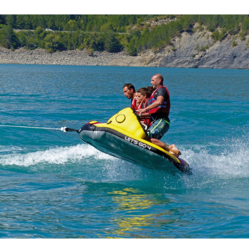 Spinera Professional Lets Go 4 Towable 4 Person Tube - Side View of 4 People Riding Tube Backwards