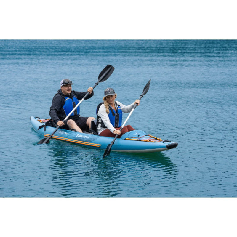 Man and Woman Paddling Spinera Tenaya 140 Inflatable Kayak in Blue Water Side View