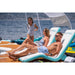 Yachtbeach Superior Sun Lounger Single - Side View of Woman and Man Laying on 2 Loungers with Child Standing Behind