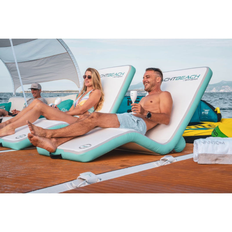 Yachtbeach Superior Sun Lounger Single - Front View of Man and Woman Laying on 2 Loungers on Floating Dock